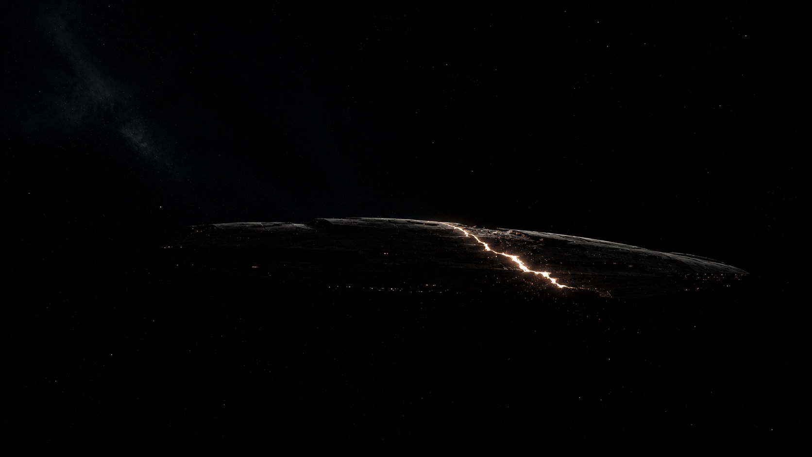 A colossal dreadnought broken by a single bright fracture of burning light, adrift in calm black space